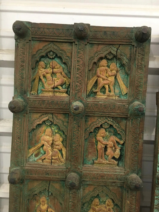 Close-up of hand-carved human figures on 1600–1900 Indian door