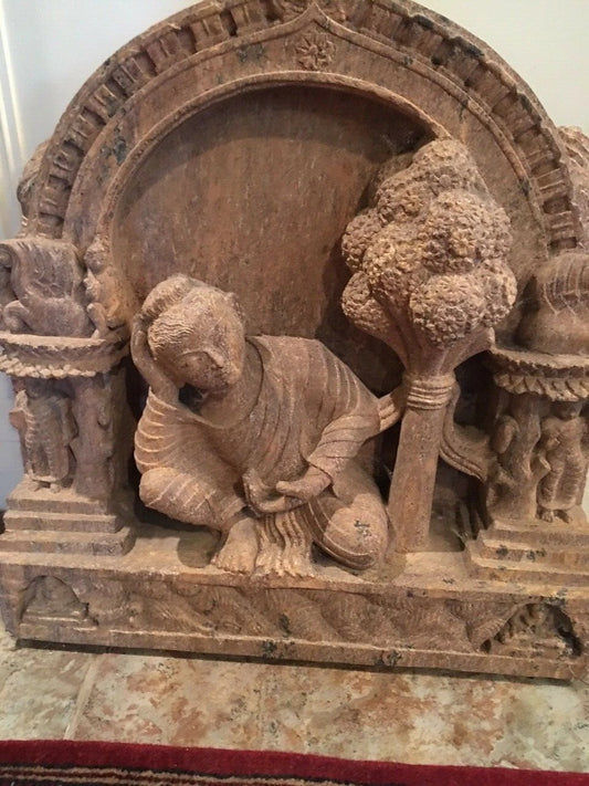 Front view of hand-carved sandstone Sleeping Buddha statue 24 inches