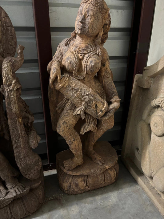 Hand-carved stone sculpture of a dancing woman playing a drum – 1998 Indindji folk art