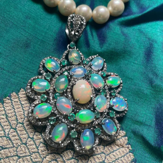 Handcrafted luxury necklace with pearl strand and gemstones
