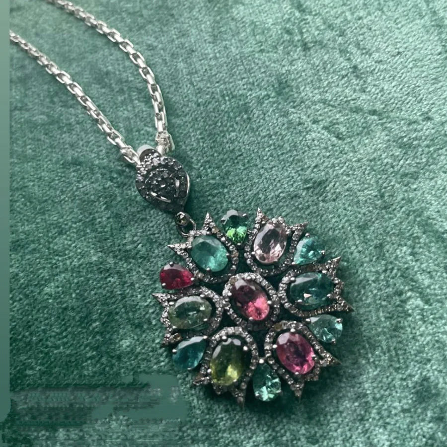 Multi-tourmaline pendant with diamonds in sterling silver